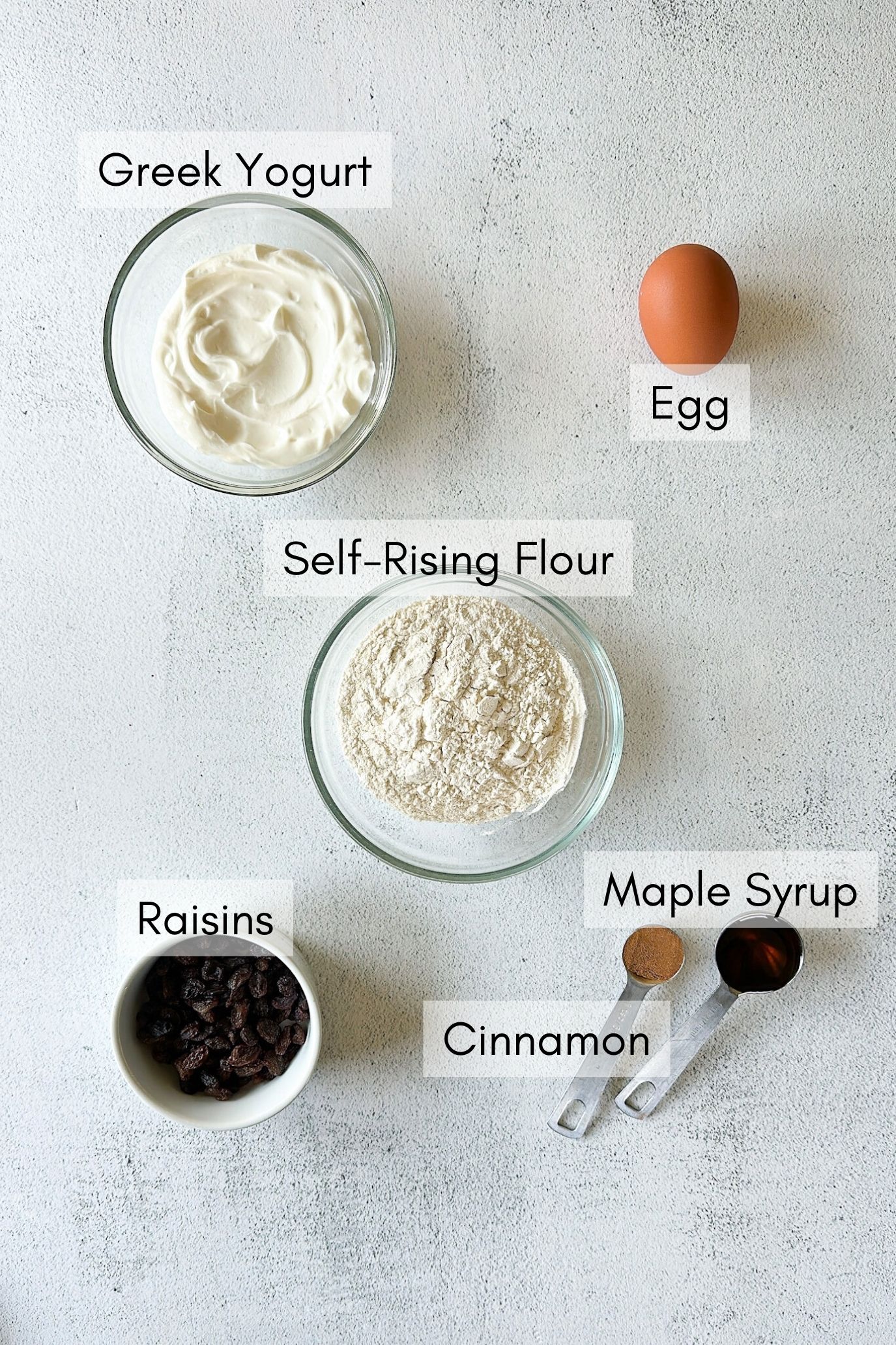 Ingredients to make cinnamon raisin bagels.