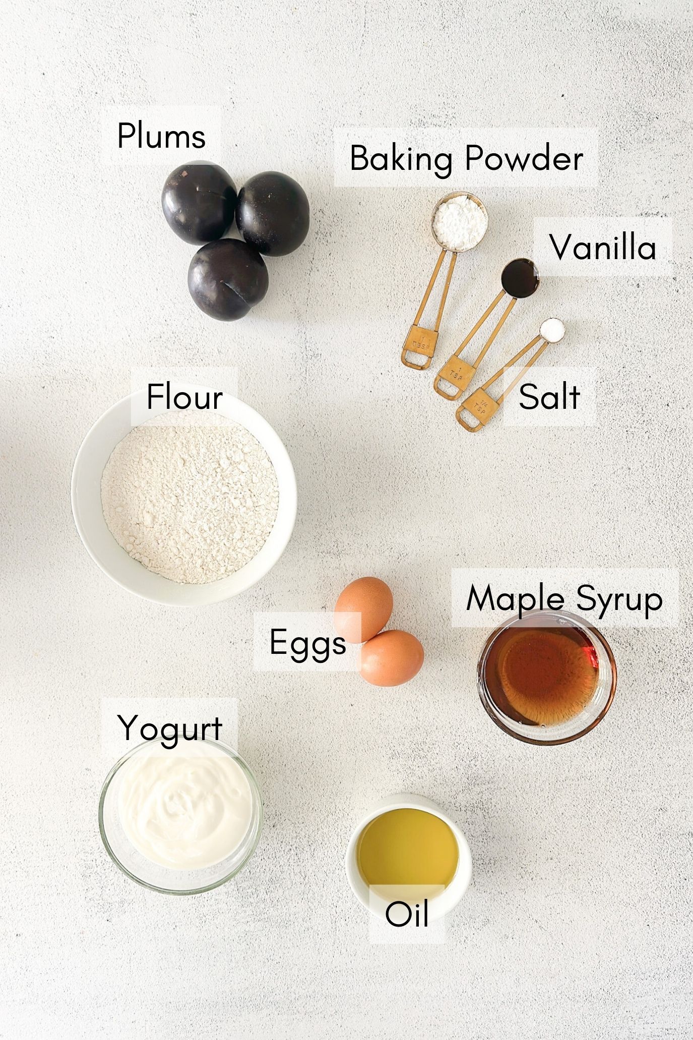 Ingredients to make yogurt plum cake.