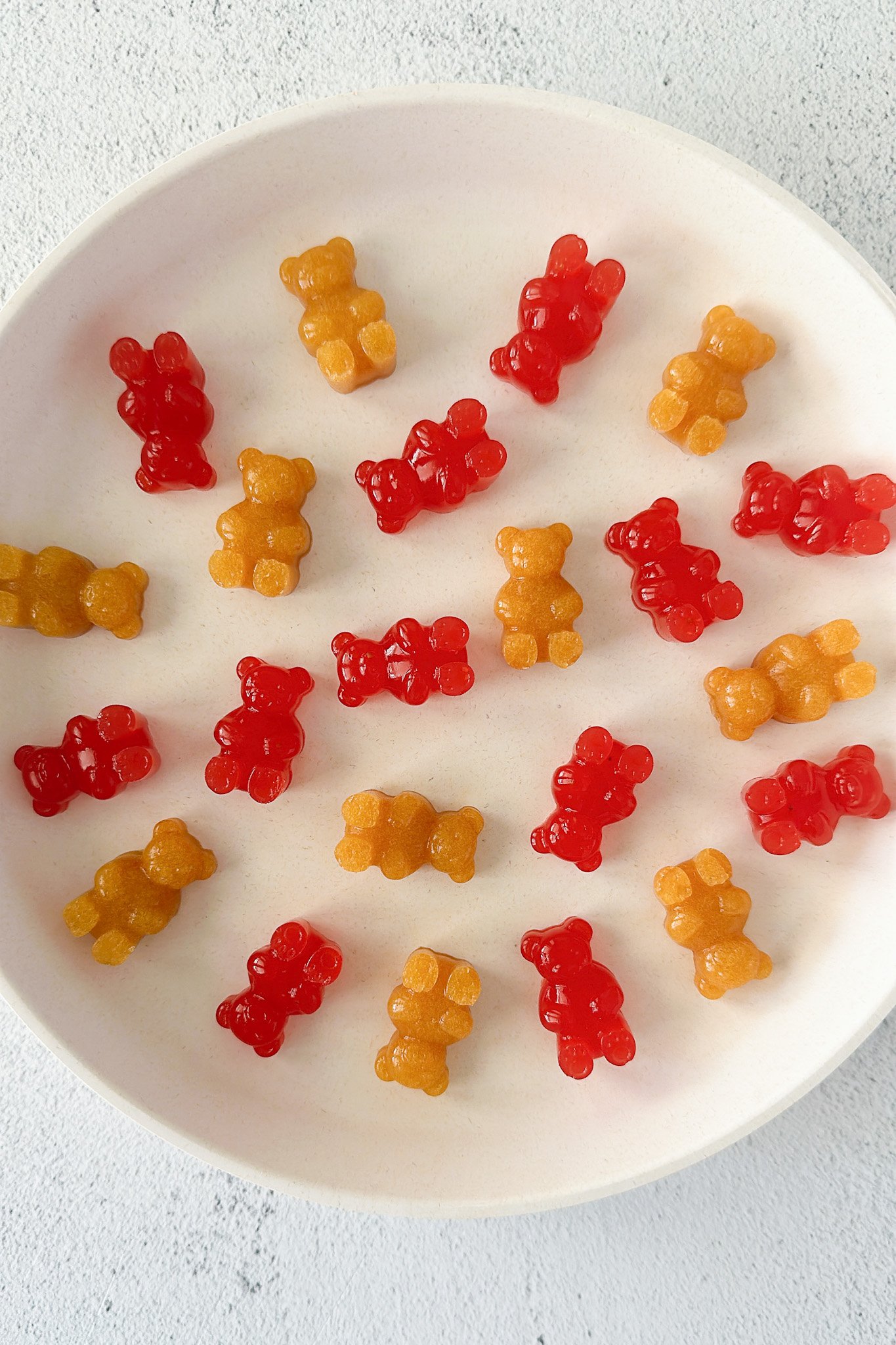 Homemade peach and watermelon gummy bears.