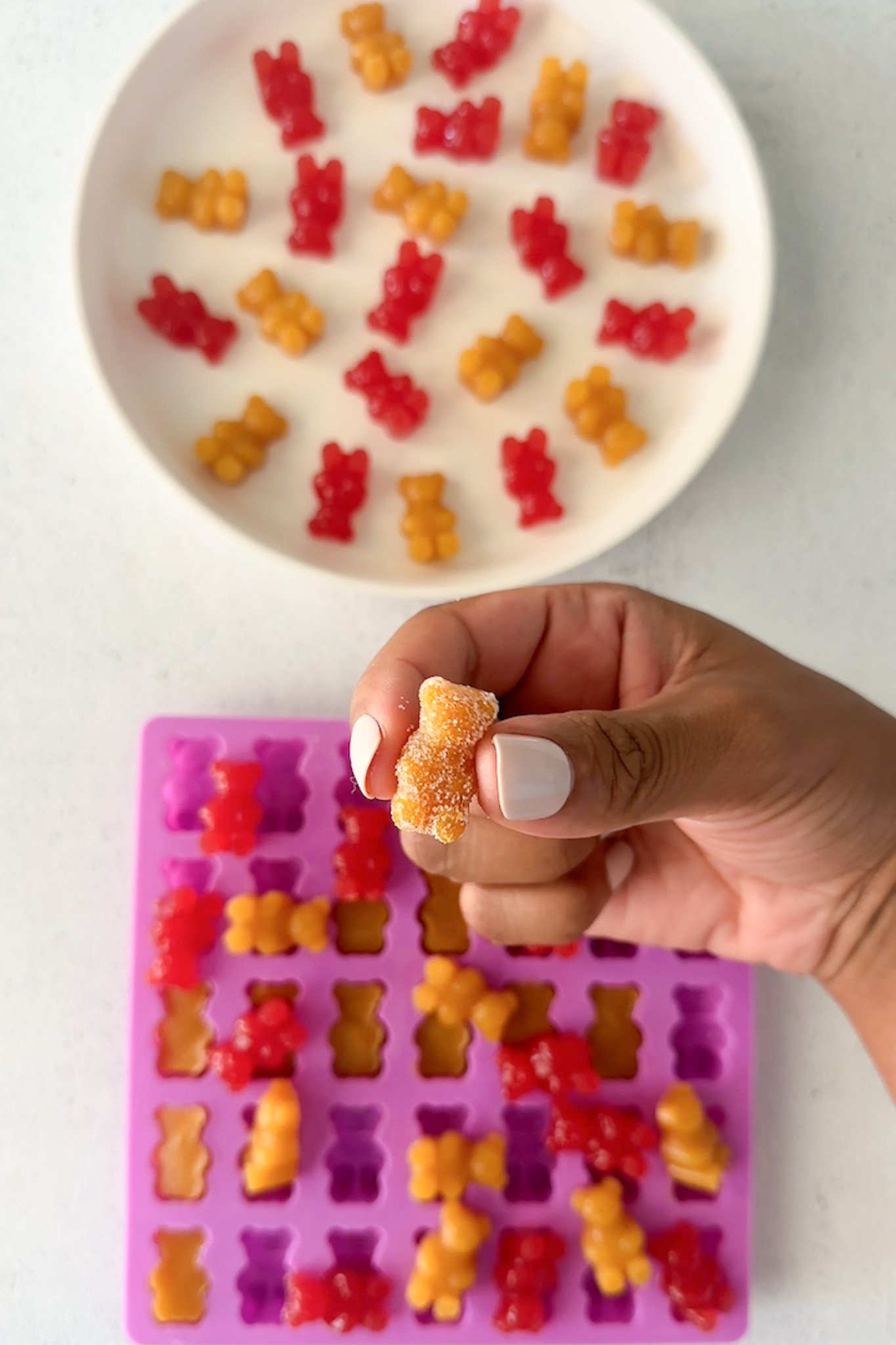 Homemade peach and watermelon gummy bears.