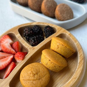 Pumpkin maple muffins served with berries.