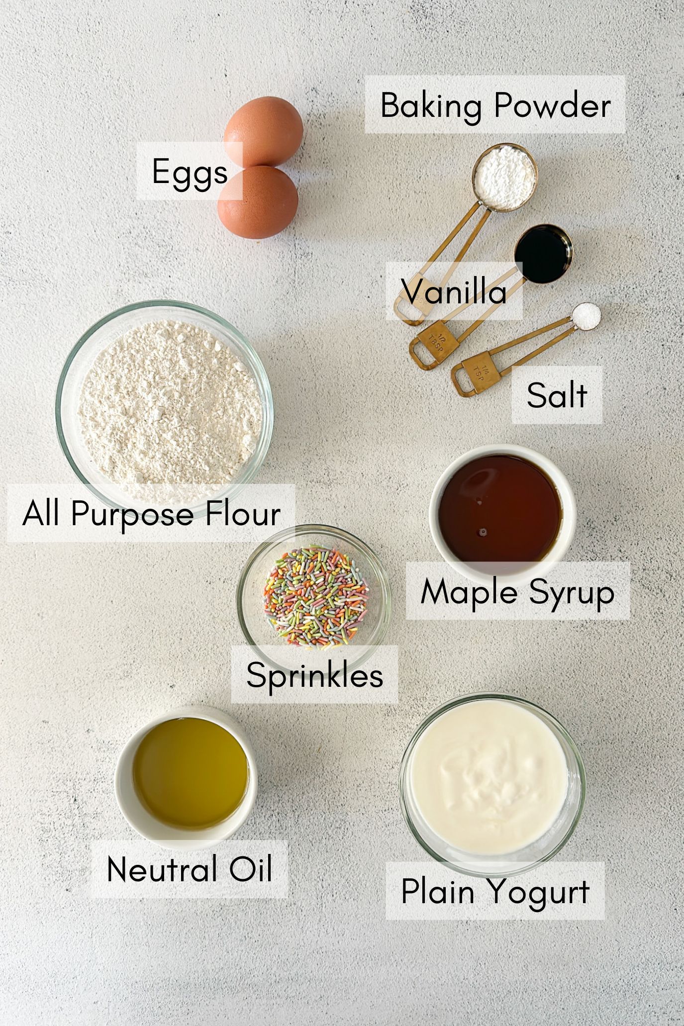 Ingredients to make funfetti muffins.