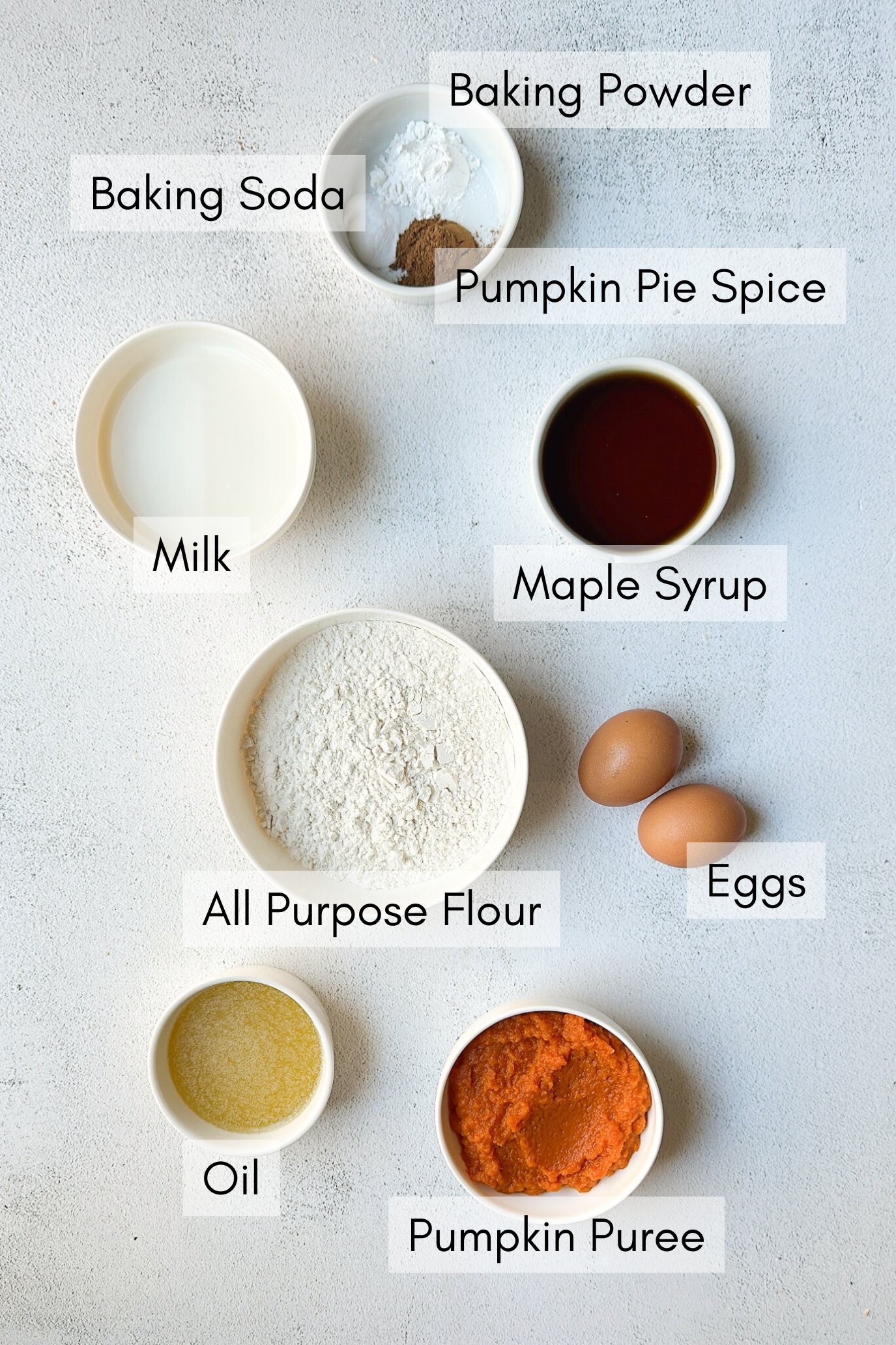 Ingredients to make pumpkin snack cake.