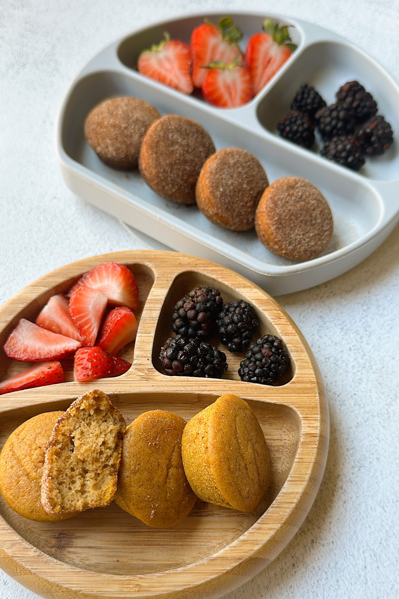 Pumpkin maple muffins served with berries.