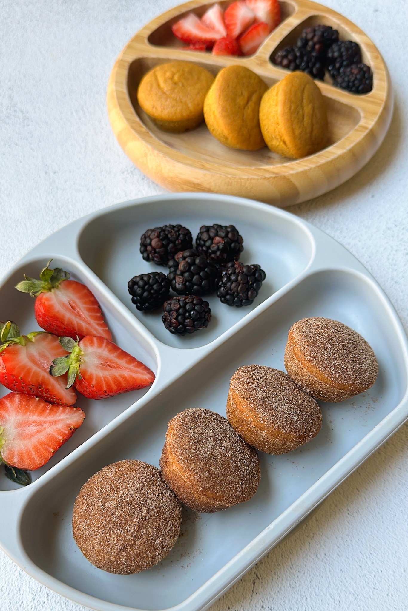 Pumpkin maple muffins served with berries.