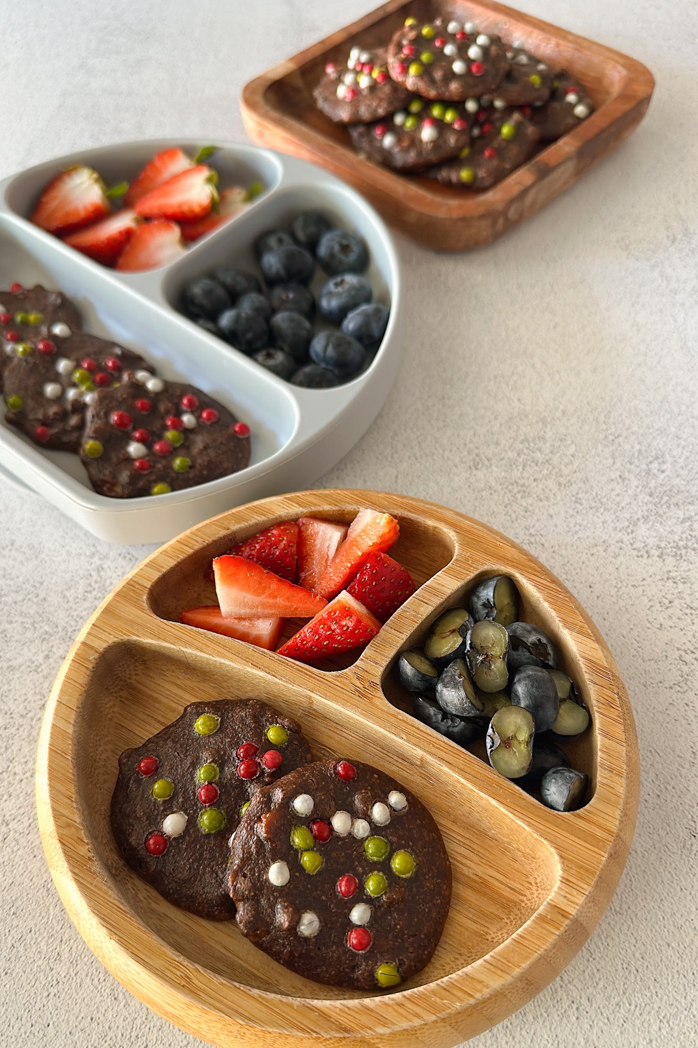 Healthy brownie cookies served with berries.