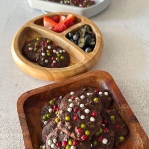 Healthy brownie cookies served with berries.