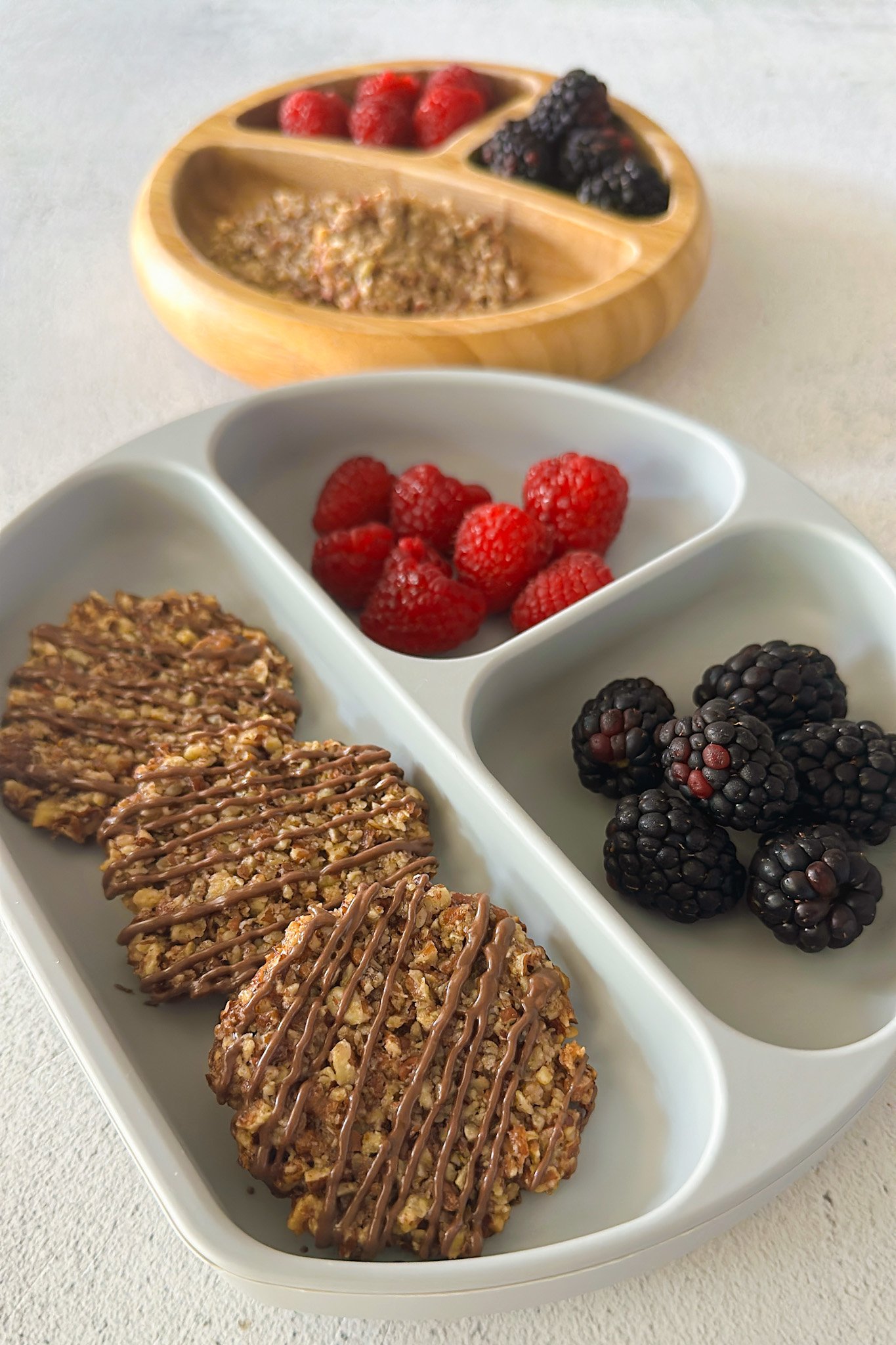 Maple pecan cookies served with berries.