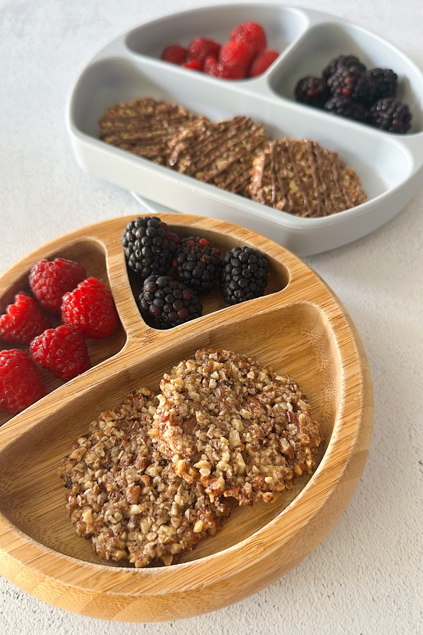 Maple pecan cookies served with berries.