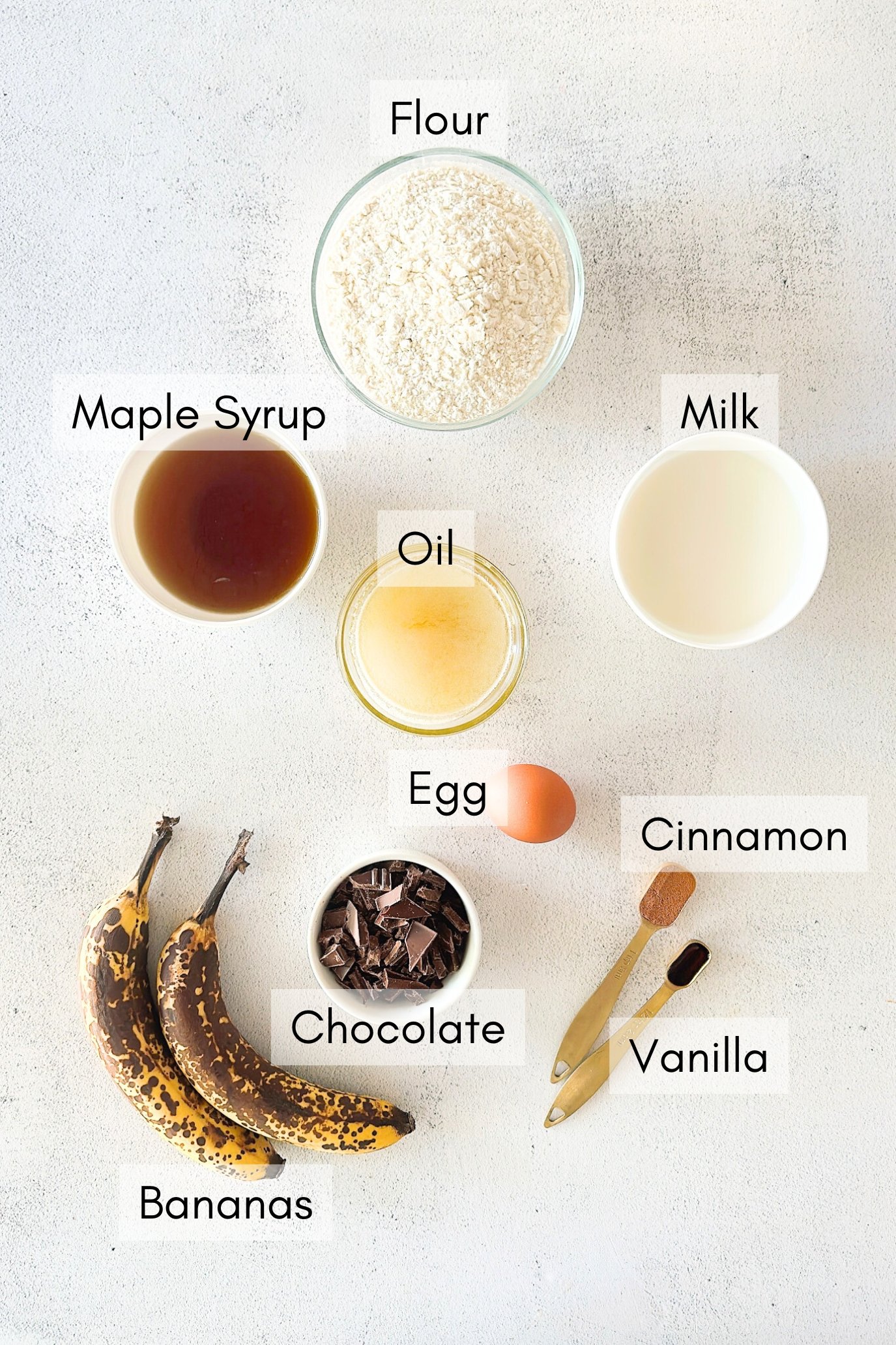 Ingredients to make chocolate chunk banana muffins.