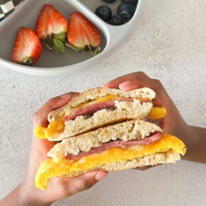 Freezer breakfast sandwich served with berries.