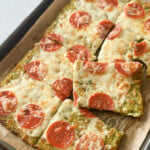 Cheesy zucchini flatbread fresh from oven.