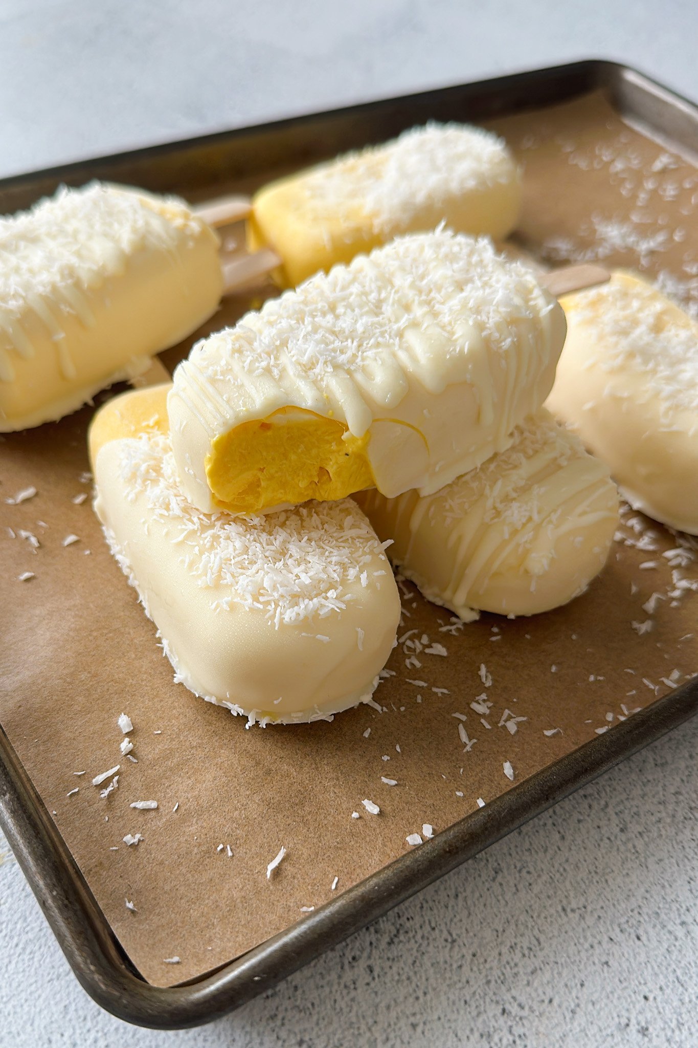Mango coconut ice cream bars.