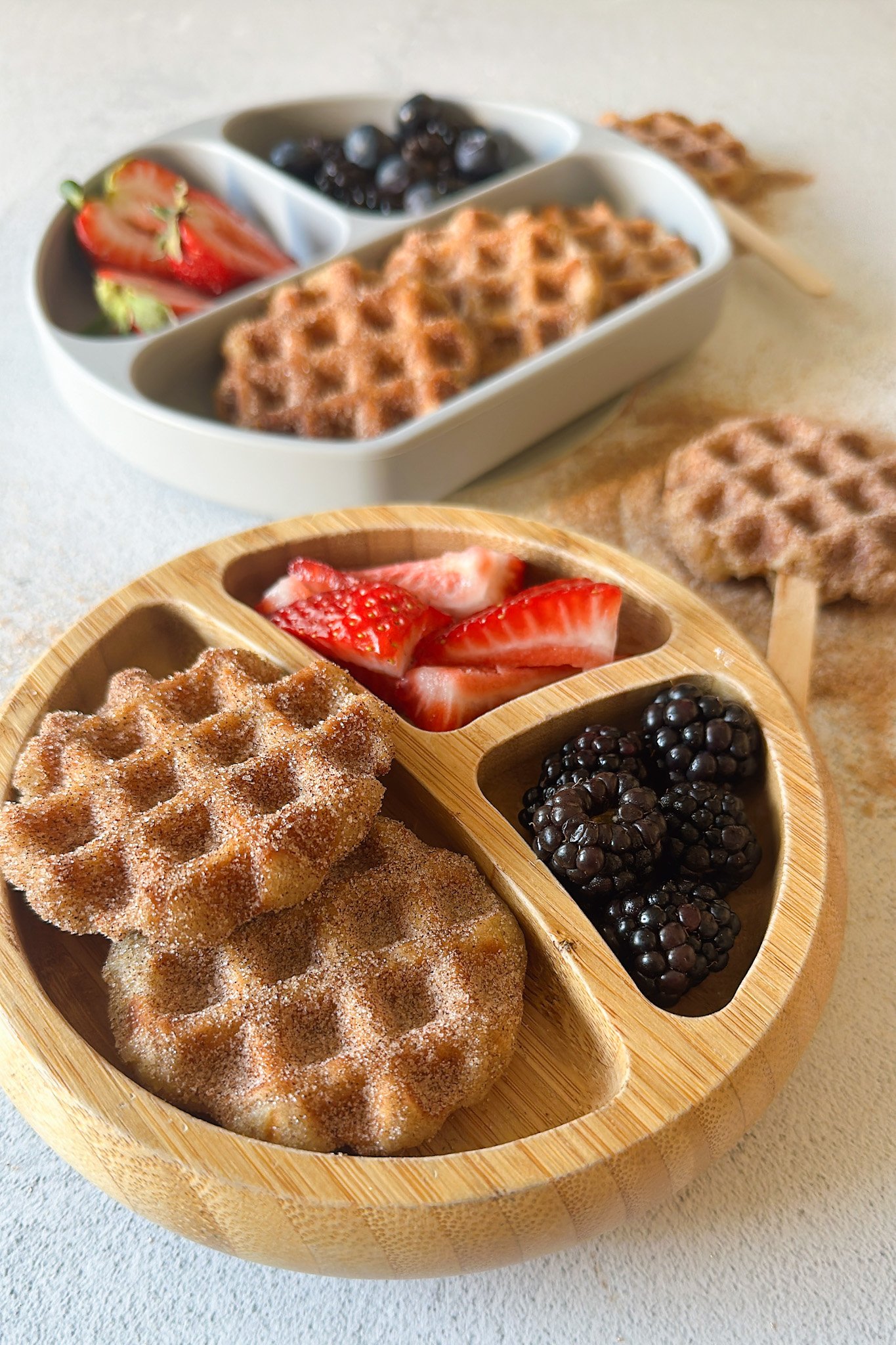 Churro waffles served with berries.