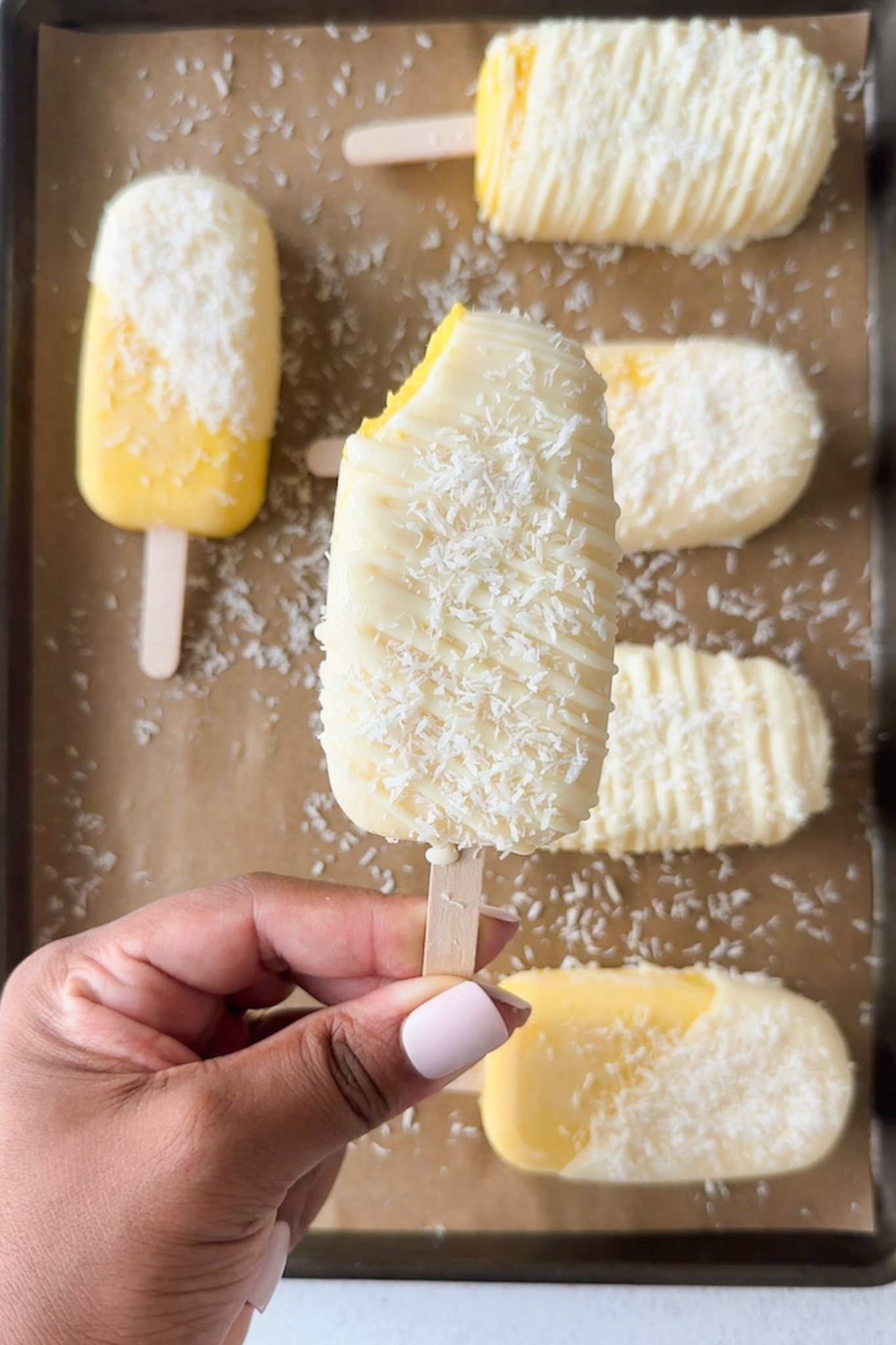 Mango coconut ice cream bars.