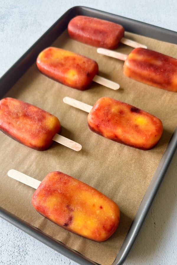 Mango cherry popsicles.