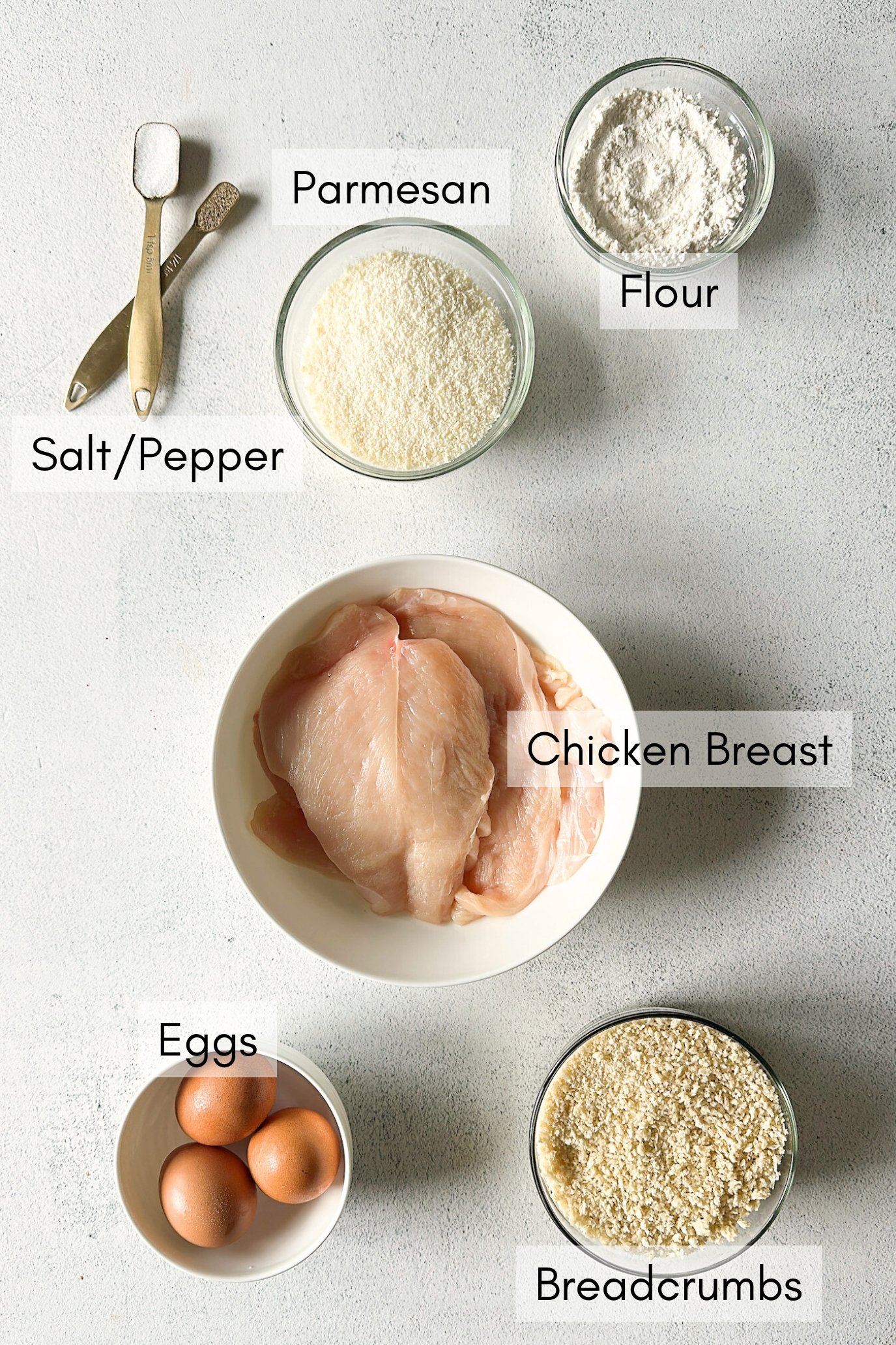 Ingredients to make crispy panko chicken.