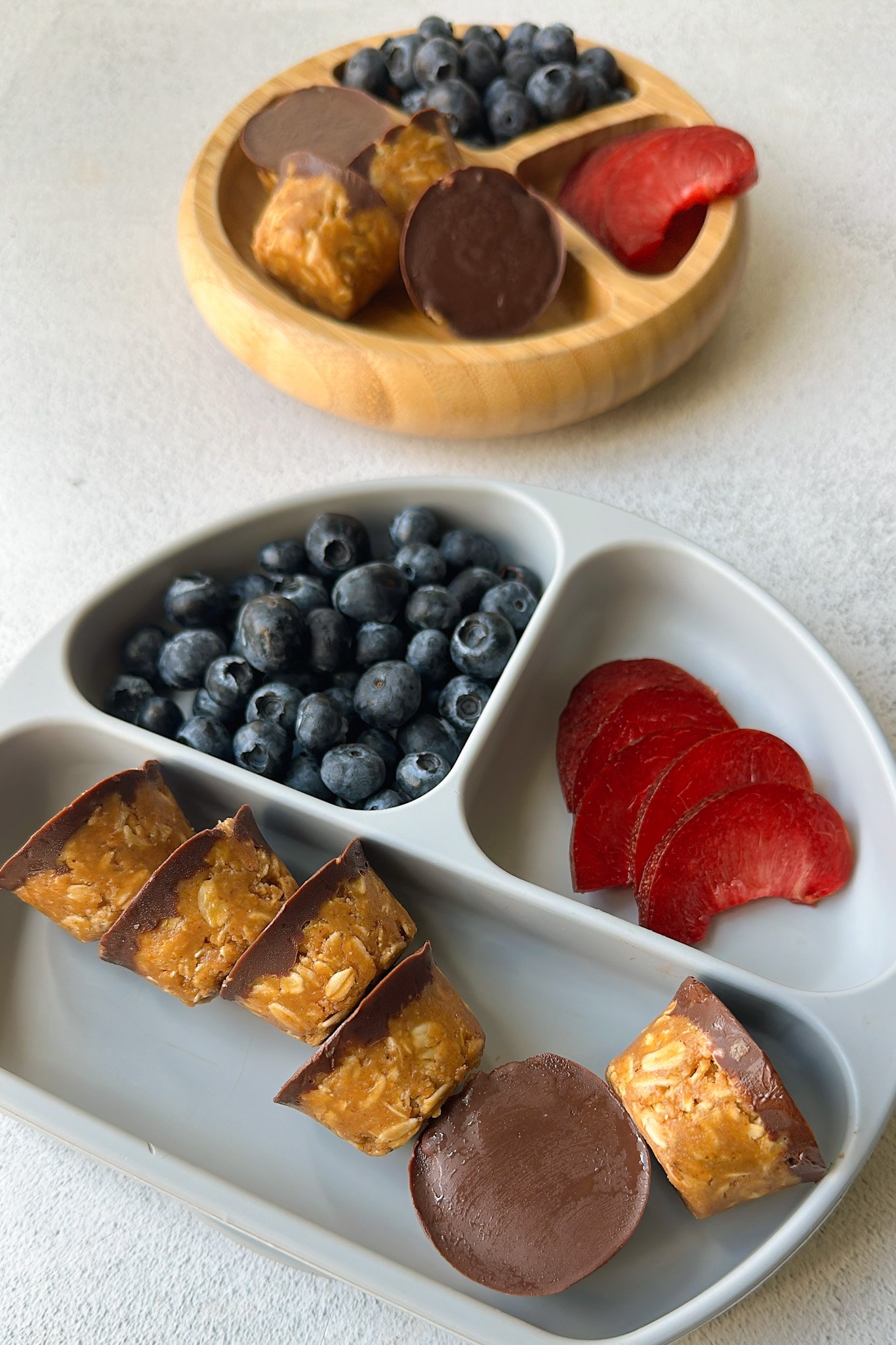 Peanut butter oatmeal cups served with berries.