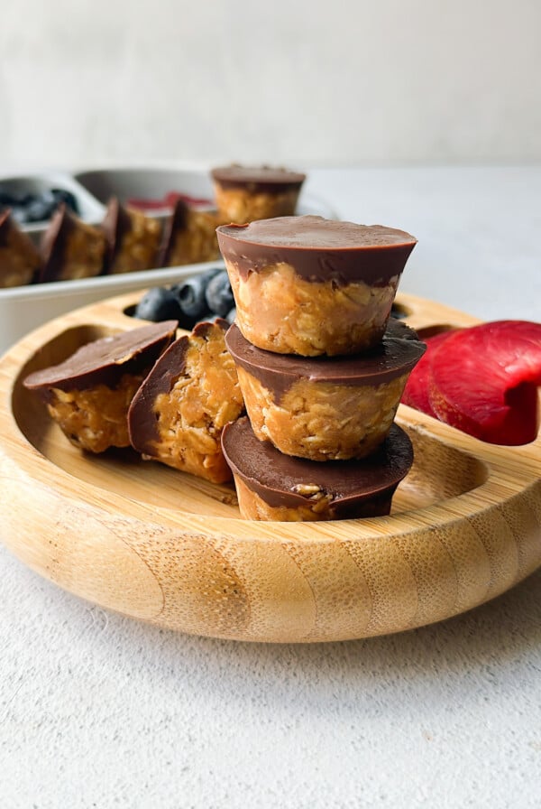 Peanut butter oatmeal cups served with berries.
