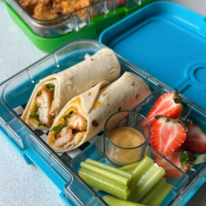 Chicken nuggets wrap served in a lunchbox.