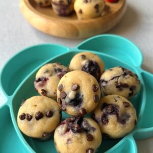 Blueberry and chocolate chip muffins served with berries.