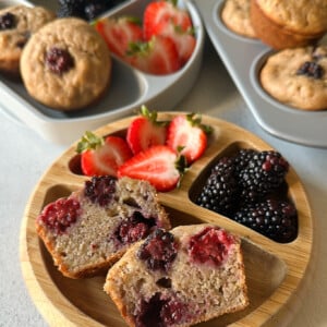 Banana blackberry muffins served with berries.
