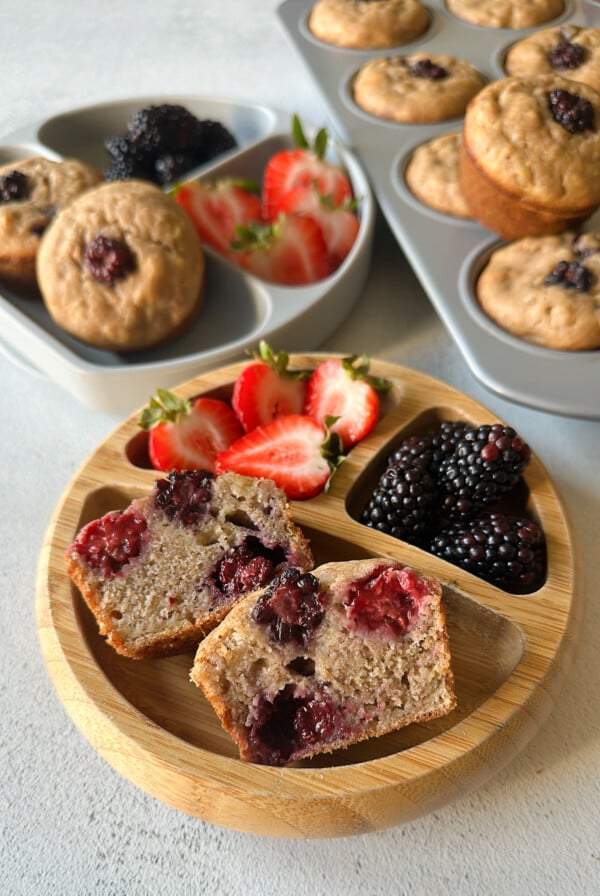 Banana blackberry muffins served with berries.
