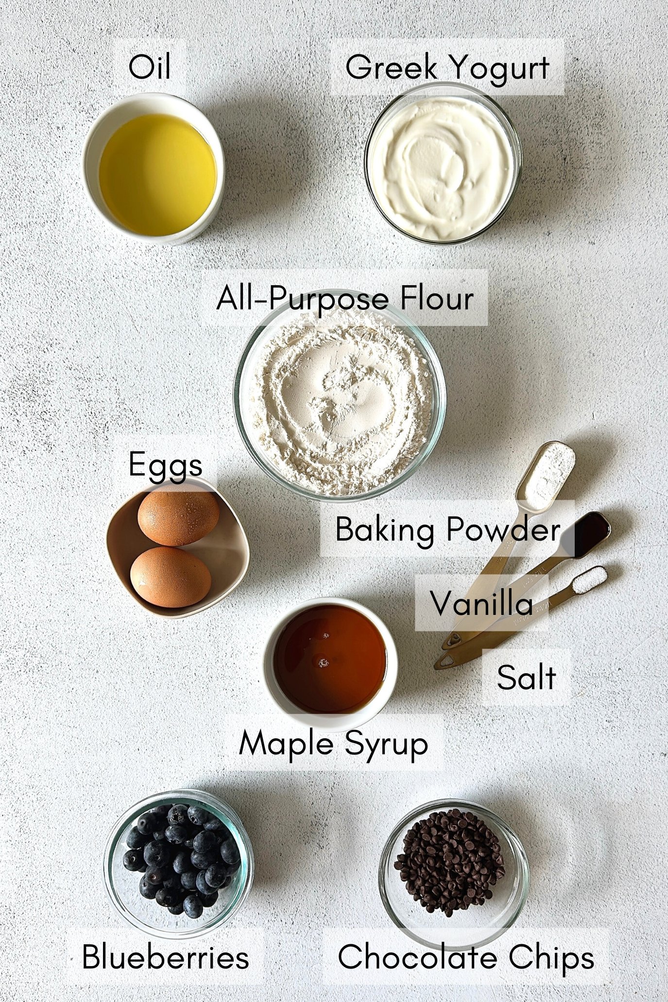 Ingredients to make blueberry chocolate chip muffins.