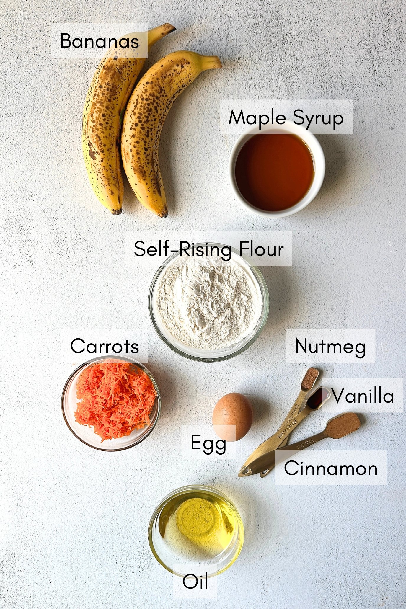 Ingredients to make carrot banana muffins.