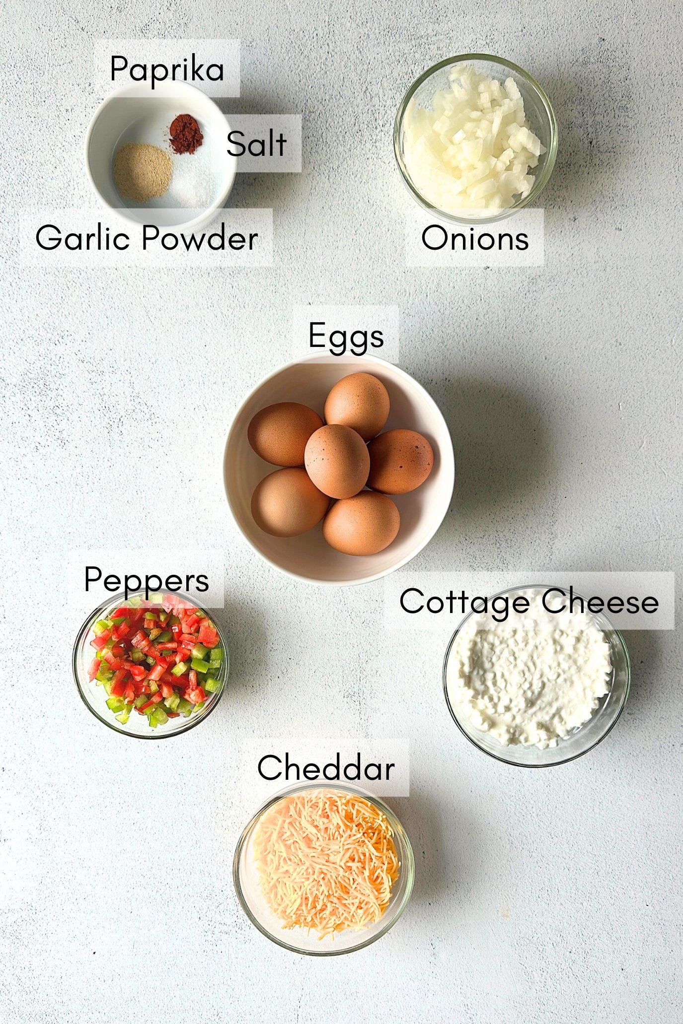 Ingredients to make cottage cheese egg casserole.