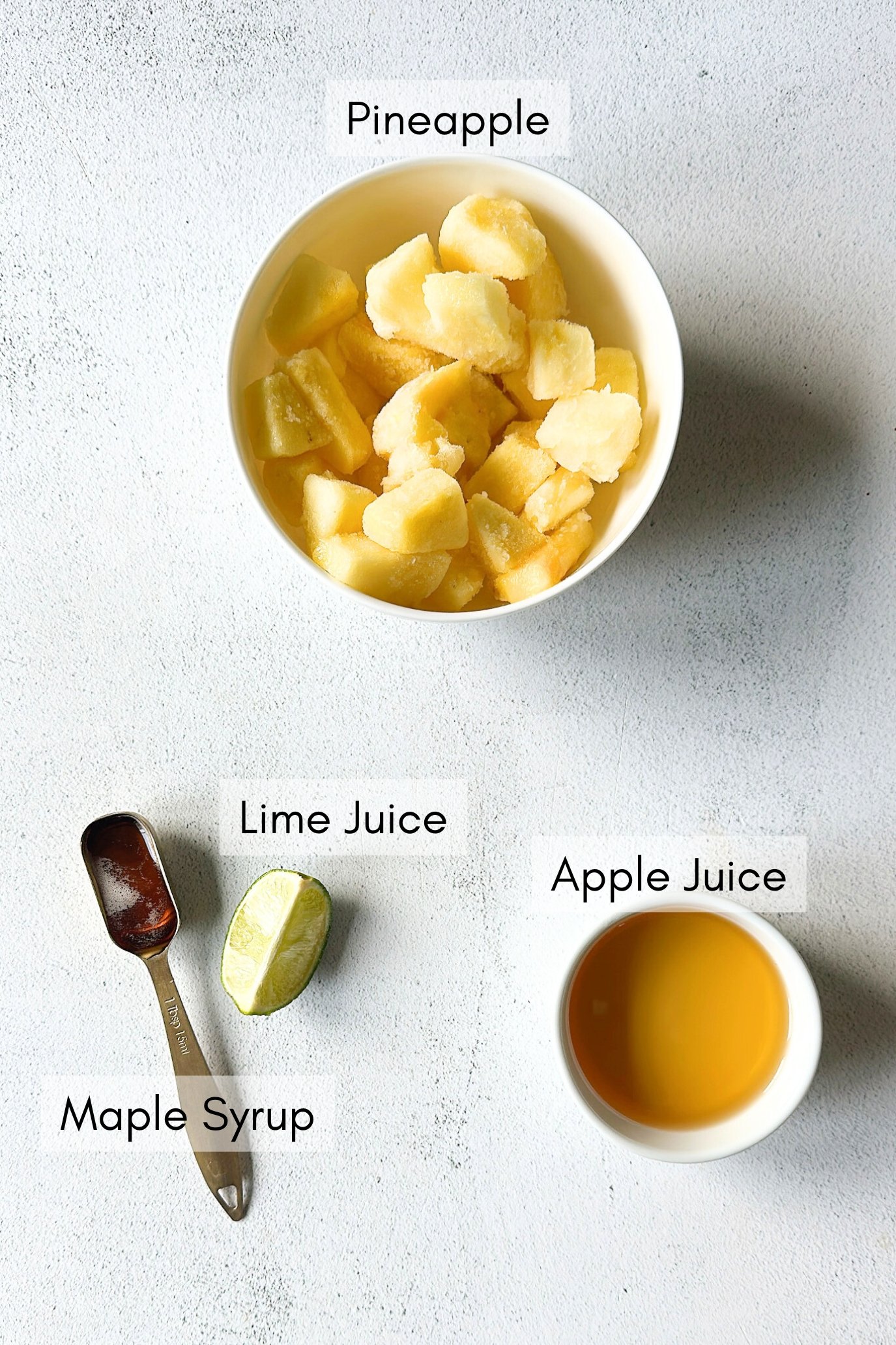 Ingredients to make pineapple popsicles.