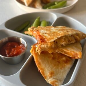 Chicken bacon ranch quesadillas served with salsa and ranch dressing.