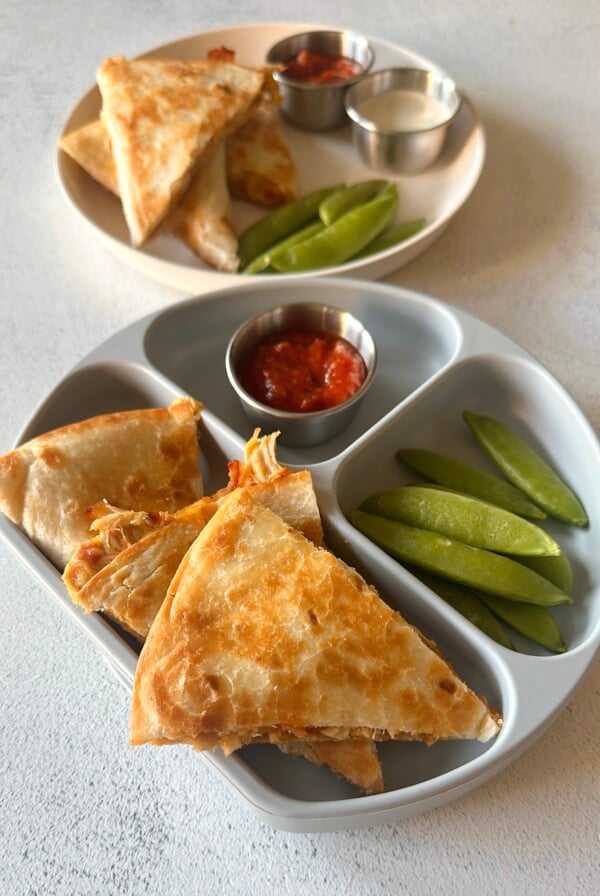 Chicken bacon ranch quesadillas served with salsa and ranch dressing.