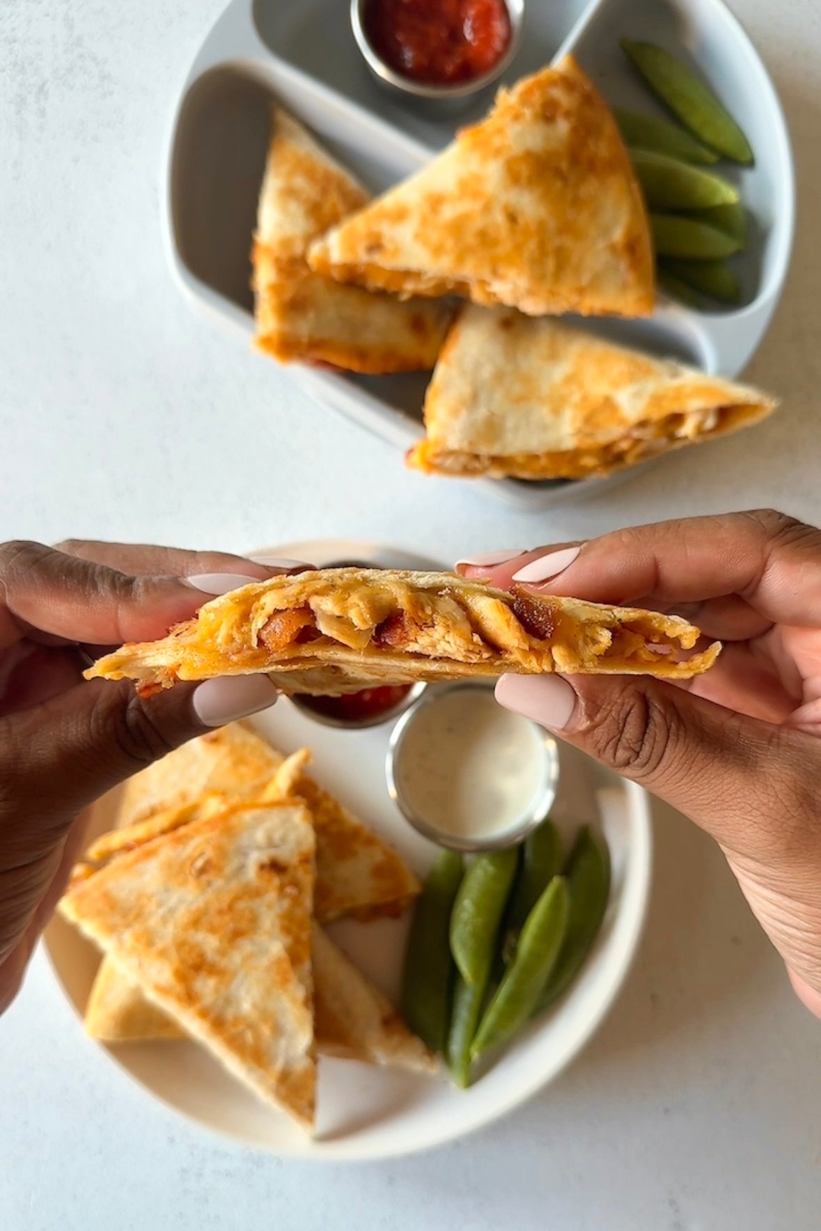 Chicken bacon ranch quesadillas served with salsa and ranch dressing.
