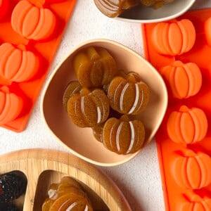 Pumpkin gummies served with berries.