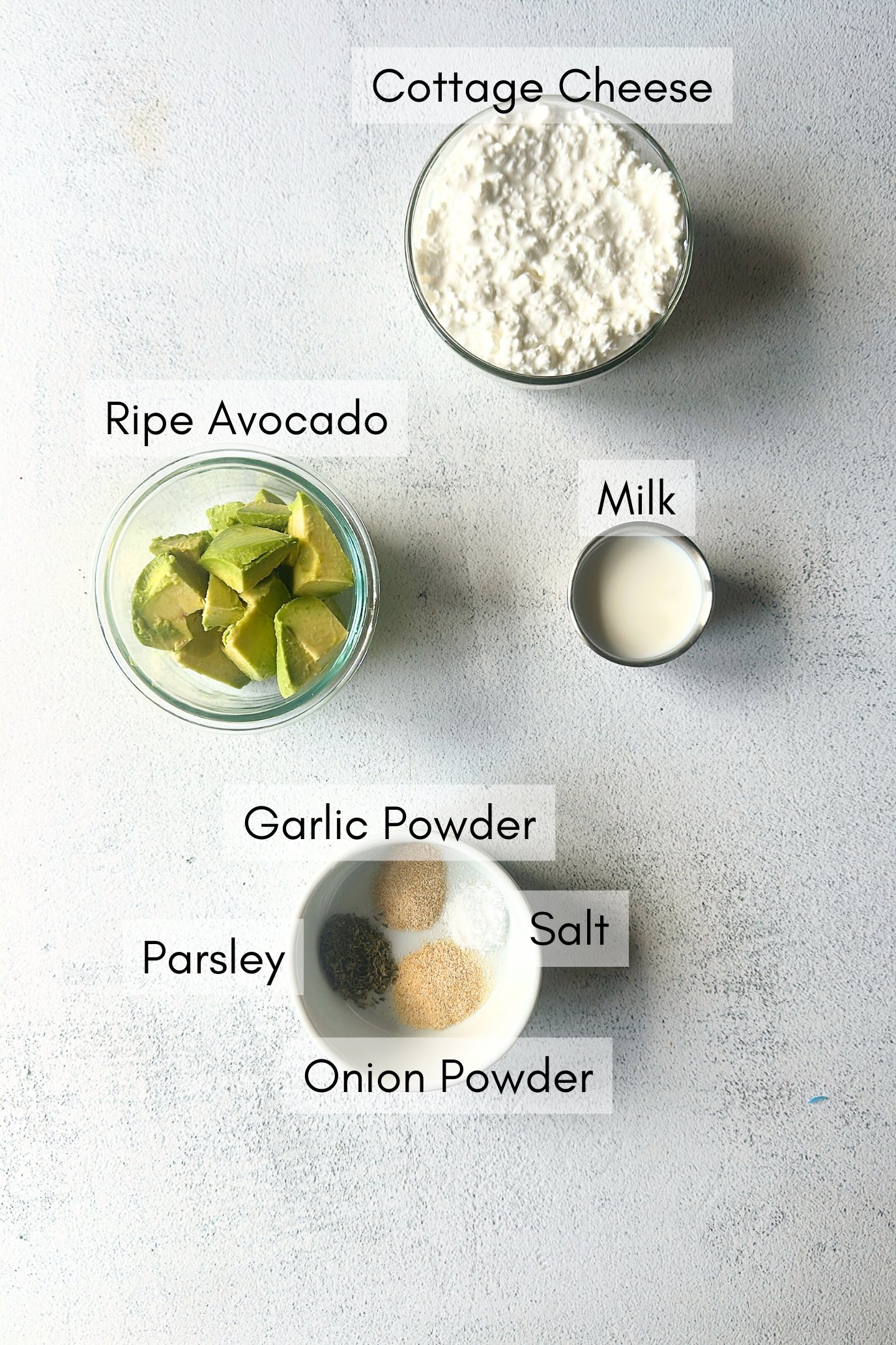 Ingredients to make avocado cottage cheese dip.