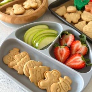 Mini sugar cookies served with fruits.