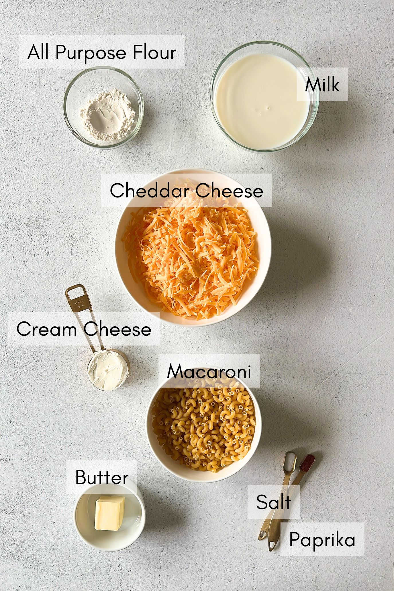 Ingredients to make mac and cheese muffins.