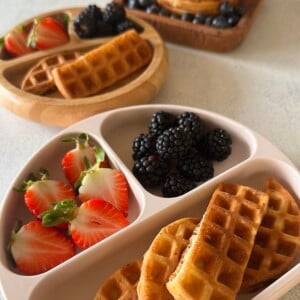 Mini waffles served with berries.