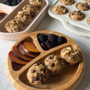 Chocolate chip banana walnut muffins served with fruits.