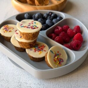 No-bake carrot cake bites served with berries.