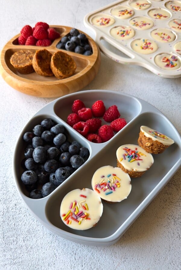 No-bake carrot cake bites served with berries.