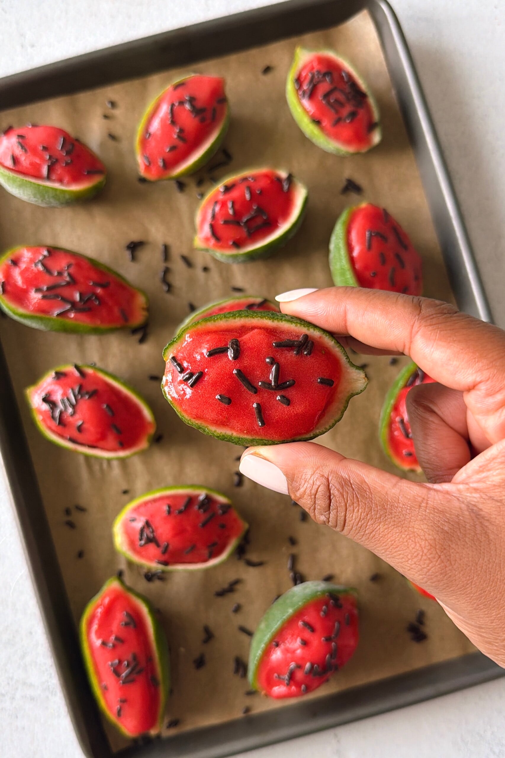 Watermelon lime sorbet served in lime skin.