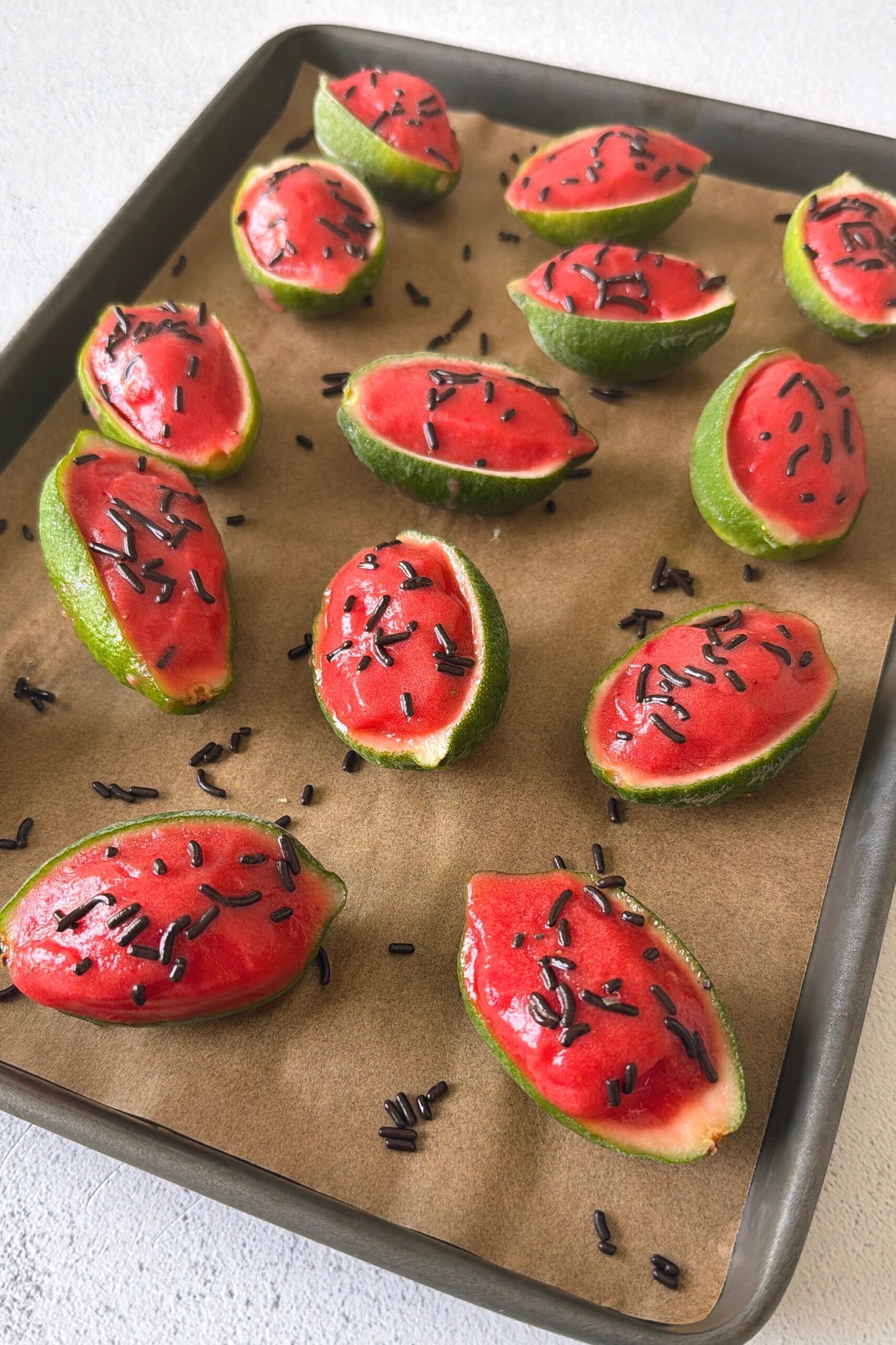Watermelon lime sorbet served in lime skin.