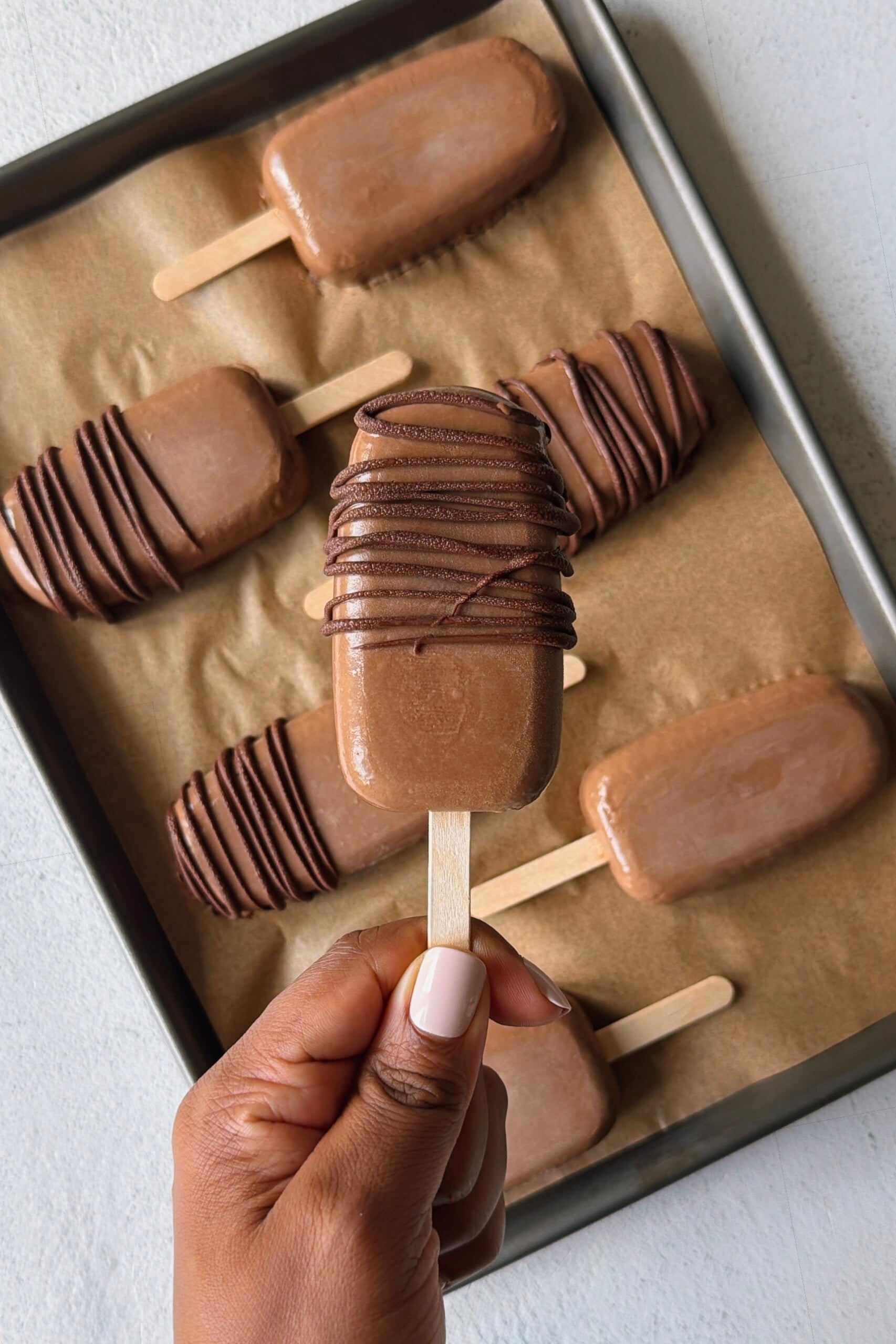 Homemade fudgesicle pops.
