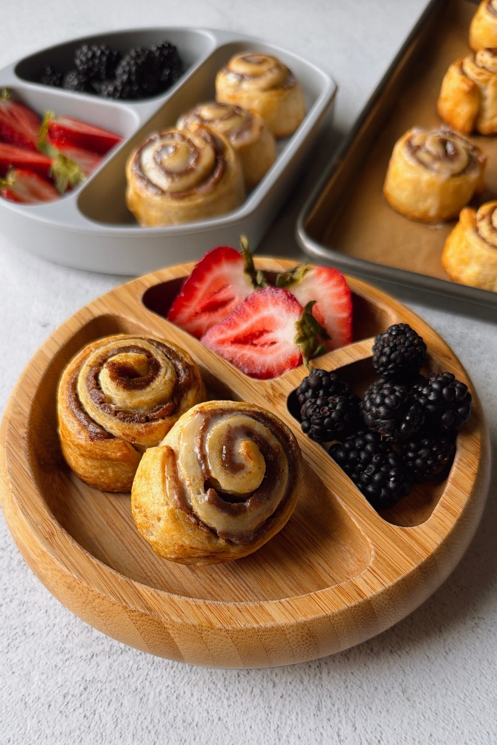 Cinnamon pinwheels served with berries.