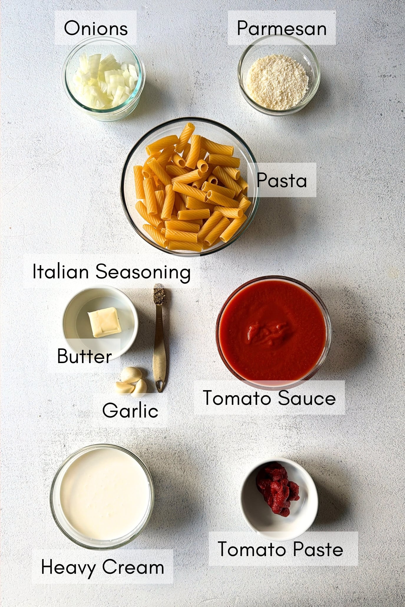 Ingredients to make creamy tomato pasta.
