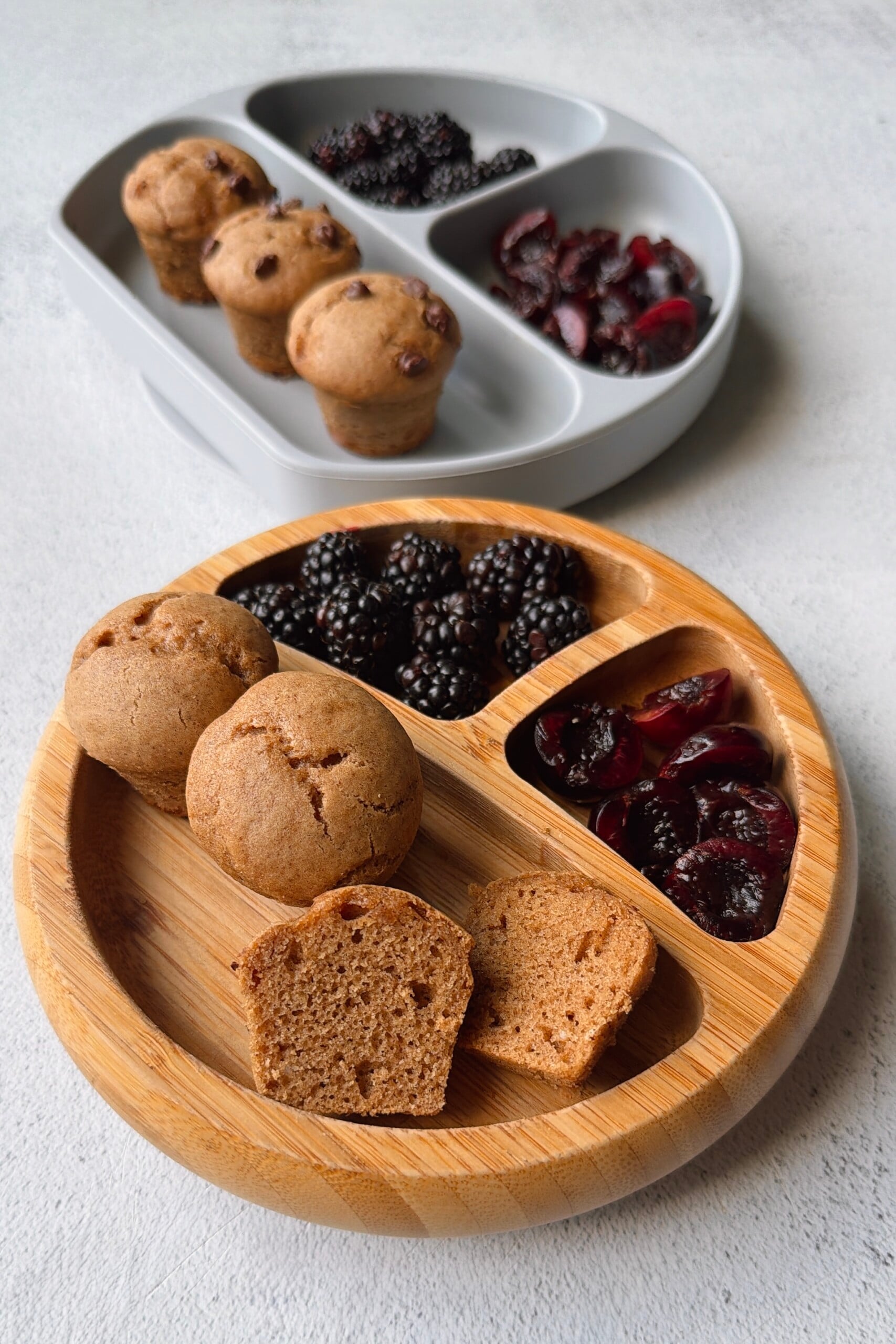 Almond butter muffins served with blackberries and cherries.