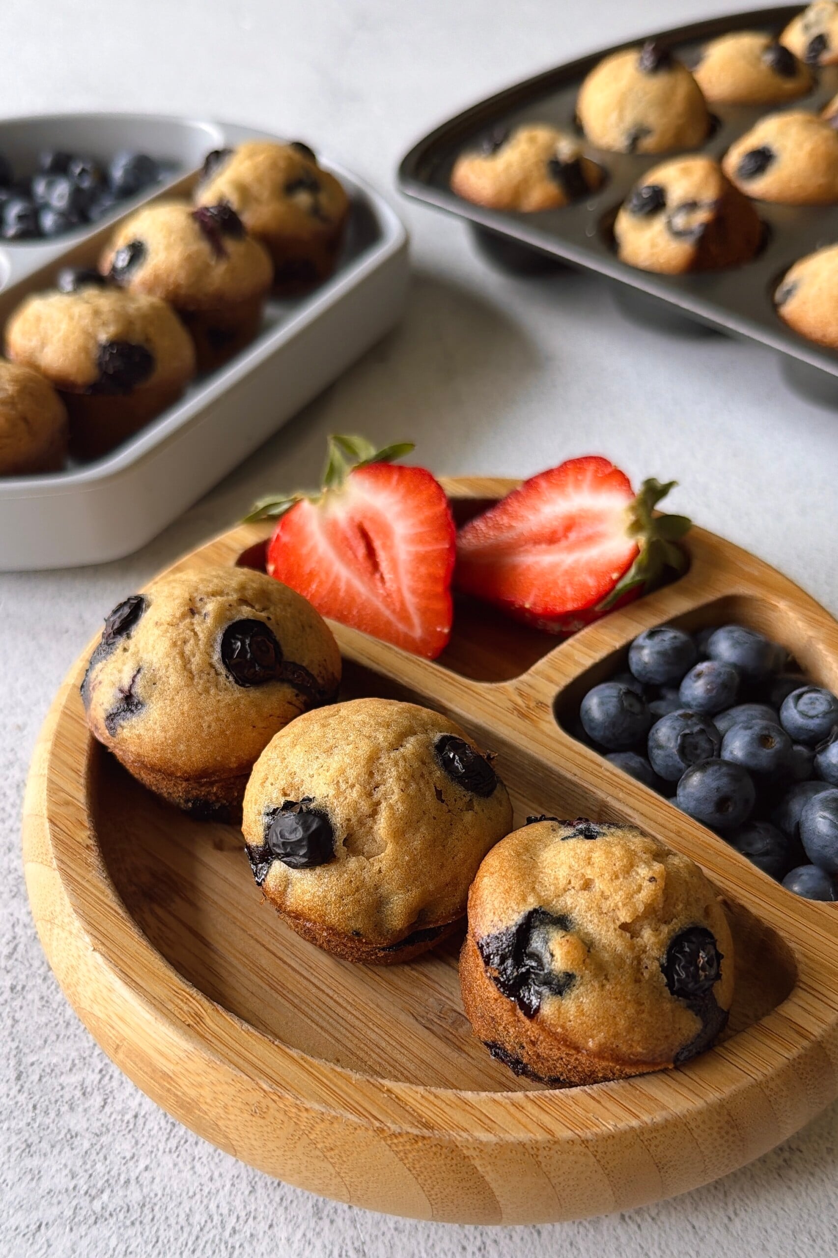 Dairy-free blueberry muffins served with berries.
