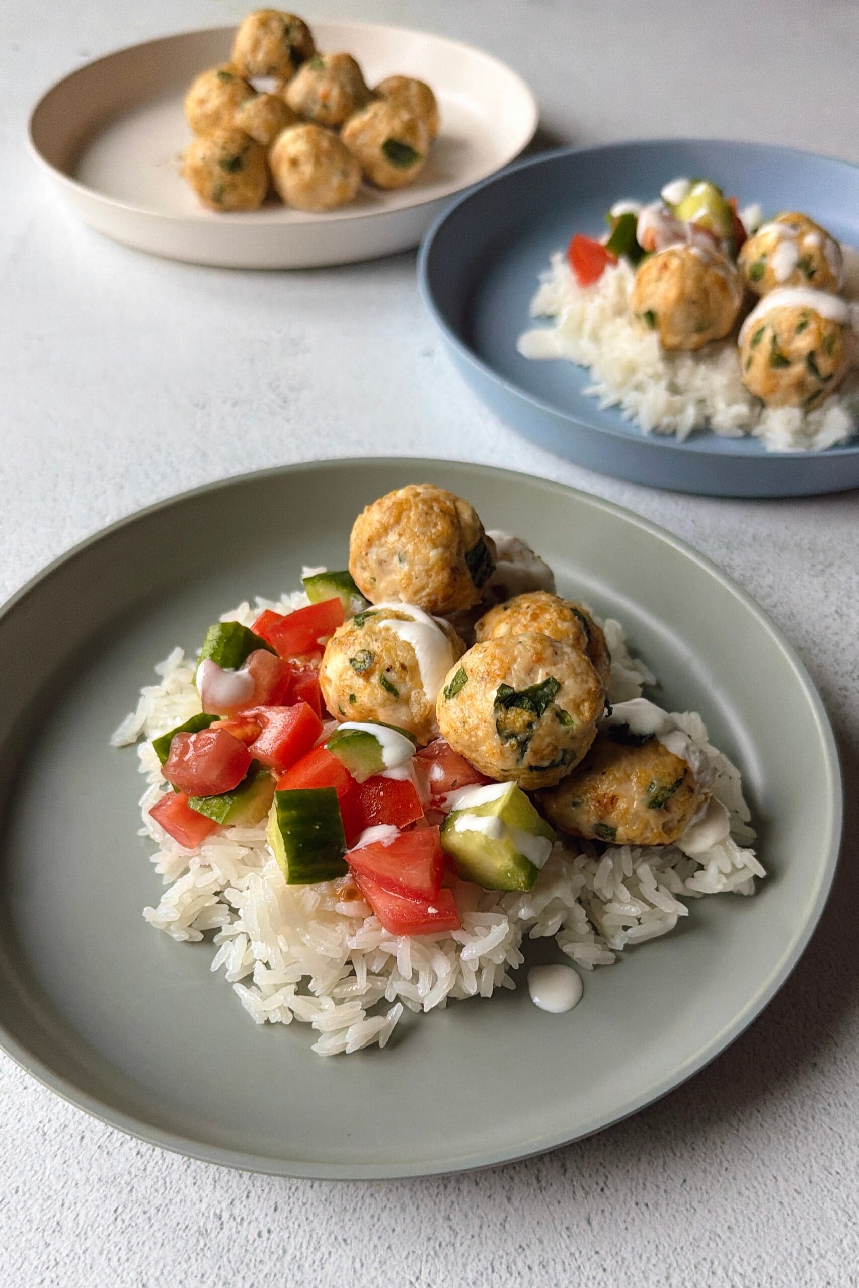 Chicken feta meatballs served over rice.